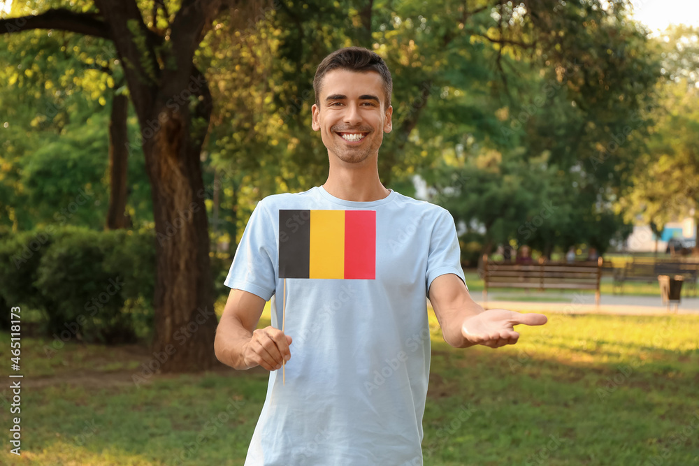 Young man with flag of Belgium outdoors Young man with flag of Belgium outdoors