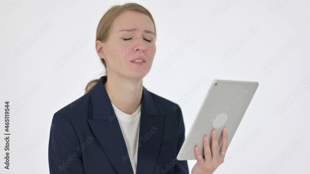 Young Businesswoman Reacting to Loss on Tablet on White Background Young Businesswoman Reacting to Loss on Tablet on White Background
