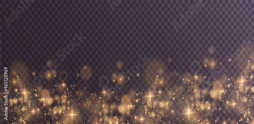 Christmas background. Powder PNG. Magic shining gold dust. Fine, shiny dust bokeh particles fall off slightly. Fantastic shimmer effect.
