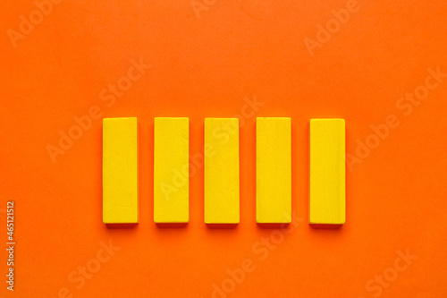 Yellow blocks on orange background