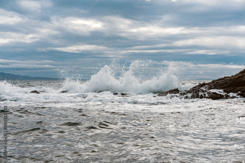 Blue and grey ocean waves crashing Blue and grey ocean waves crashing
