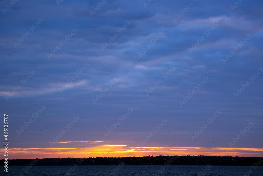 View of beautiful cloudy sky in evening View of beautiful cloudy sky in evening