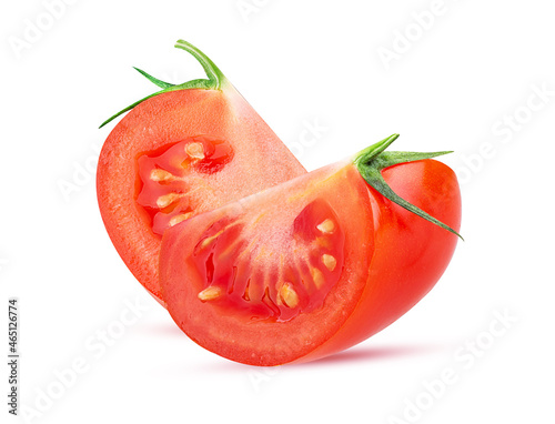 Fresh red tomato slice with green leaves
