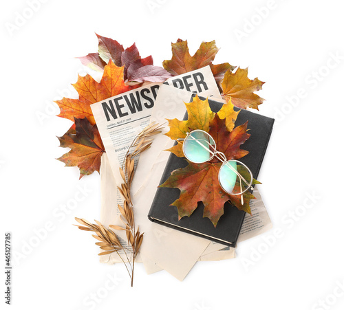 Composition with book, news...