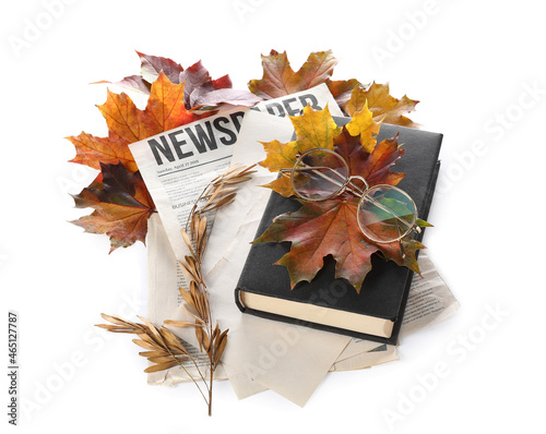 Composition with book, news...