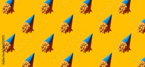 Pattern of french fries on yellow pastel background