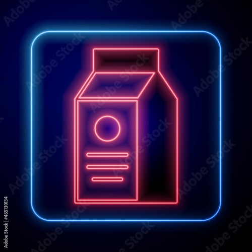 Glowing neon Paper package for milk icon isolated on black background. Milk packet sign. Vector