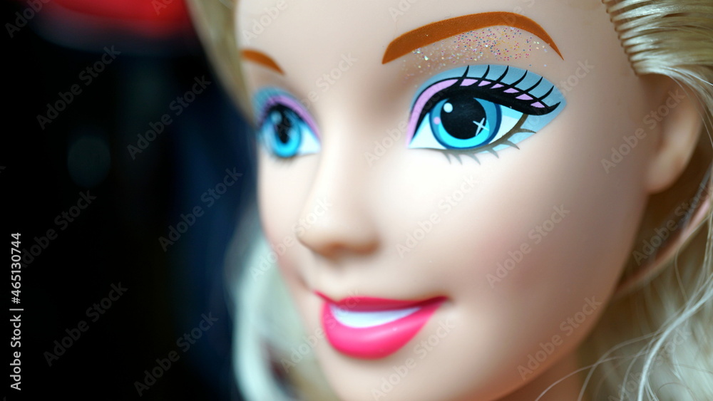 Macro view of the face and eyes of a Barbie doll with glam makeup Stock  Photo | Adobe Stock