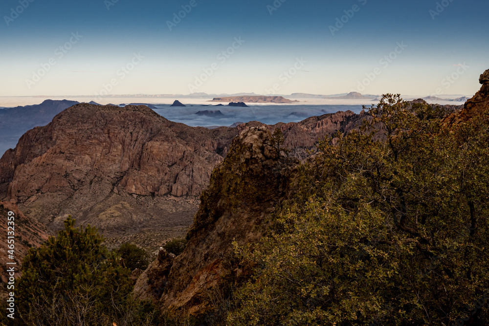 The Pinnacles Look over The Chisos Basin and Foggy Valley Beyond
