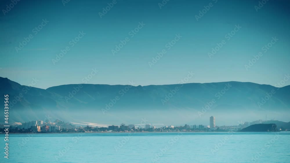 Seaside spanish landscape with Puerto de Mazarron in the distance. Mediterranean Sea, coastline in Murcia Spain.