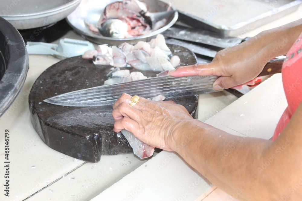 Fototapeta premium chef preparing fish