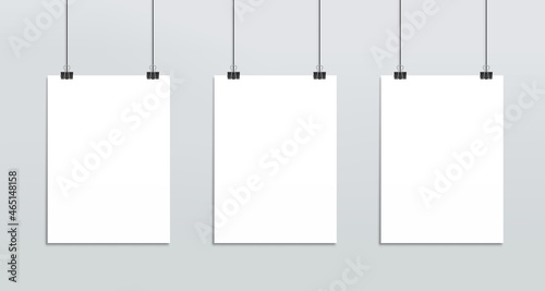 Hanging white paper posters mockup, realistic white sheets of paper on strings, photo gallery. Vector 3d blank mock up. isolated empty vertical boards, frame for picture, photo, message hang on clips
