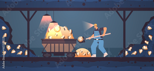 man miner digging and extracting bitcoins in mine cave mining crypto coins digital cryptocurrency blockchain