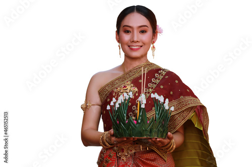 Portrait beatuiful Asia woman with Traditional Thaidress handle handmade Krathon to pray respect to Gooddess of water on full moon Roy Krathong festival held every November . added clipping parth photo