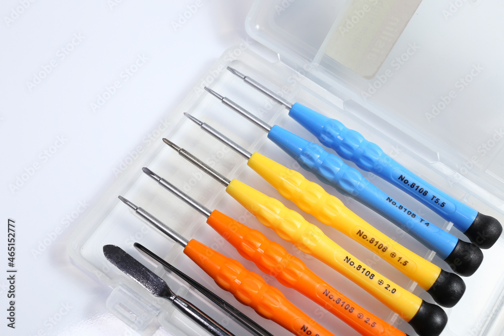 Screwdriver set for cell phones and pc. Computer repair tools. Colored screwdrivers in transparent case. Screwdriver set for cell phones and pc. Computer repair tools. Colored screwdrivers in transparent case.