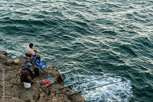 fishermen on the coast near Boca do Inferno, Cascais, Portugal