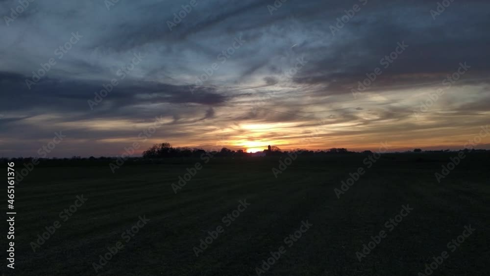 Hyper Lapse of a sunset in the Netherlands. on the horizon there is the small village of Hilaard, situated in the meadows in the spring. Hyper Lapse of a sunset in the Netherlands. on the horizon there is the small village of Hilaard, situated in the meadows in the spring.