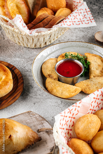 Various oriental traditional pastries on the gray table