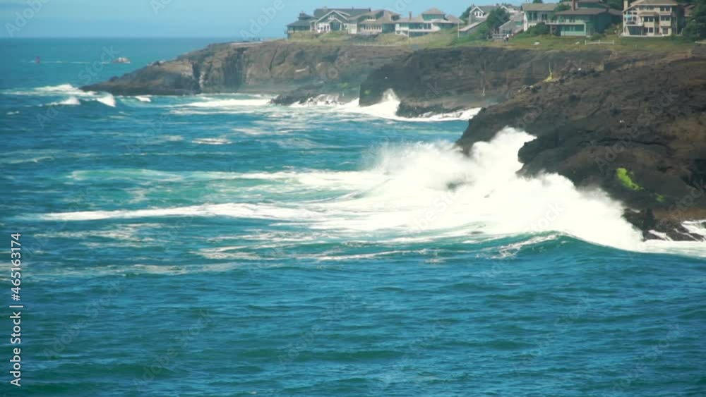 Huge waves crashing on a rocky shore in slow-motion Huge waves crashing on a rocky shore in slow-motion