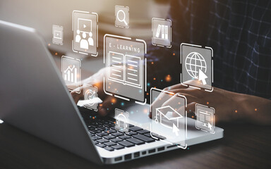 Businessman using a computer to webinar online, education on internet,  Online Courses e-learning concept.