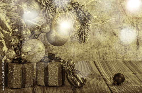 sepia gifts and branch with christmas tree decorations