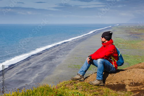 Traveler on the icelandic tour, traveling across iceland discovering natural destinations