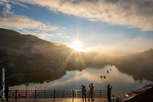 Beautiful mountain sunrise with sunlight and fog over northern Thailand's mountains