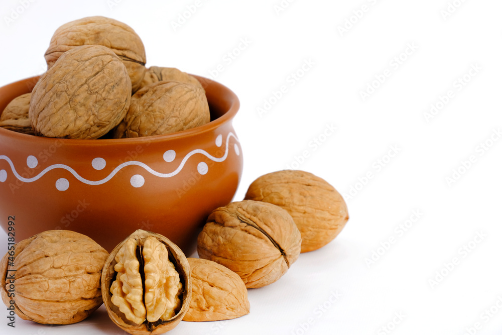 walnuts (akhrot) on white background, Dry fruits, walnut or akhrot well known dried fruit having shape like brain. walnuts (akhrot) on white background, Dry fruits, walnut or akhrot well known dried fruit having shape like brain.
