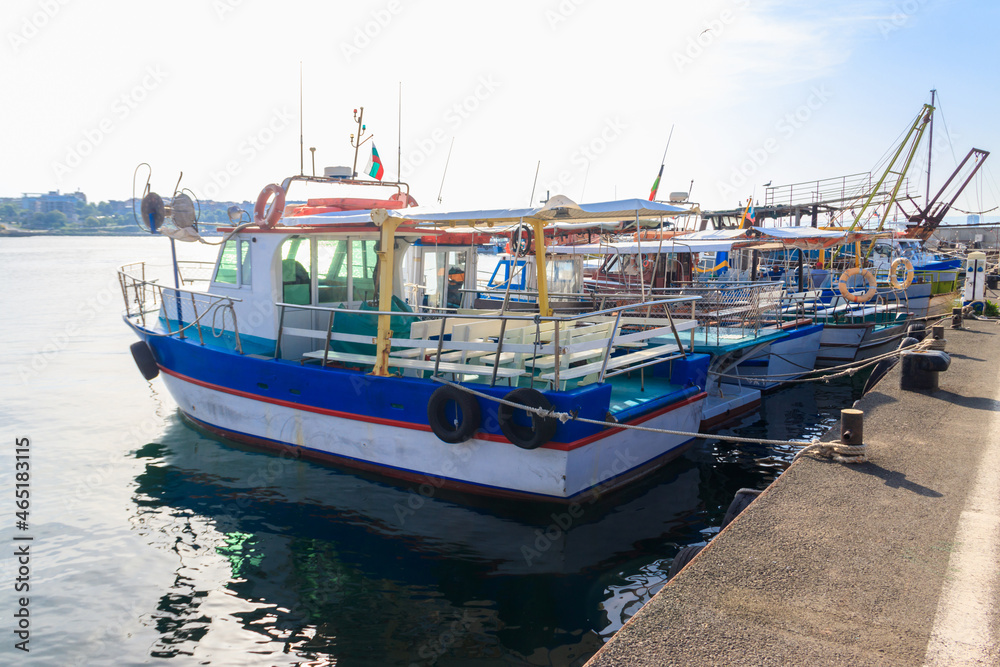 Tourist boats moored in a port in Nessebar, Bulgaria Tourist boats moored in a port in Nessebar, Bulgaria