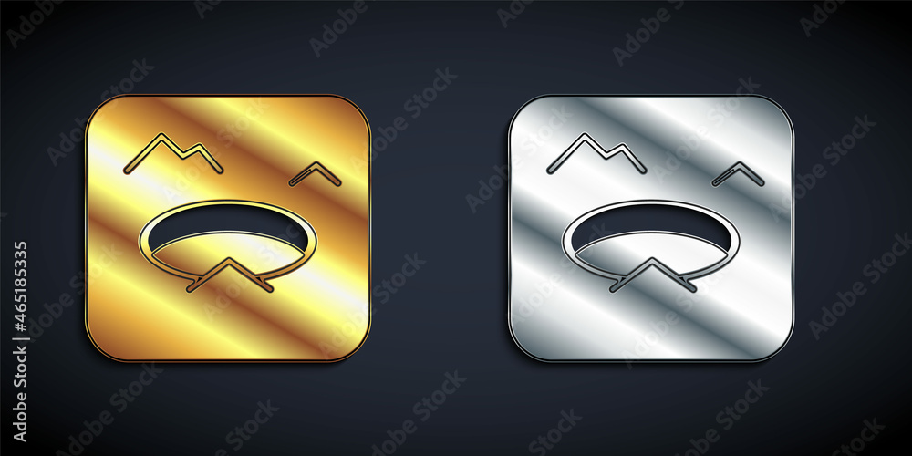 Gold and silver Winter fishing icon isolated on black background. Round ice frame. Hole in ice. Long shadow style. Vector Gold and silver Winter fishing icon isolated on black background. Round ice frame. Hole in ice. Long shadow style. Vector