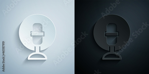Paper cut Microphone icon isolated on grey and black background. On air radio mic microphone. Speaker sign. Paper art style. Vector