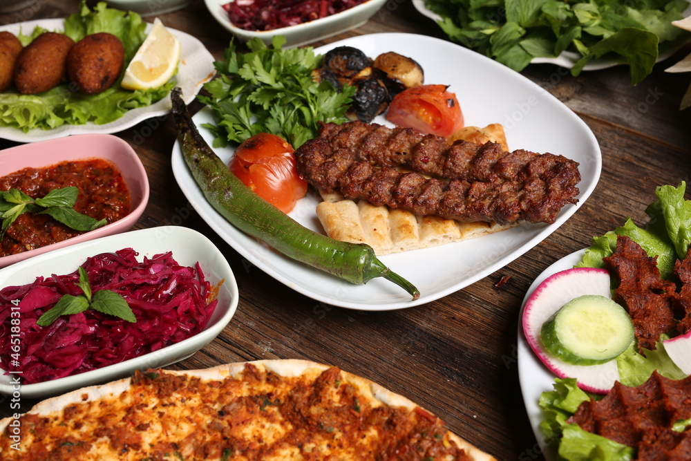 adana kebab and salad varieties adana kebab and salad varieties
