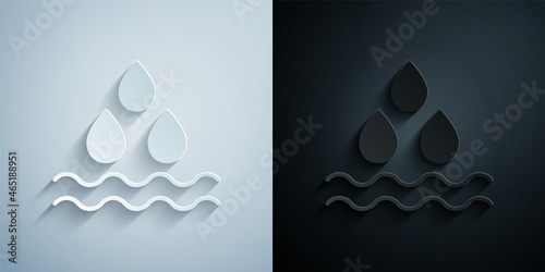 Paper cut Water drop icon isolated on grey and black background. Paper art style. Vector