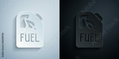 Paper cut Bio fuel canister icon isolated on grey and black background. Eco bio and barrel. Green environment and recycle. Paper art style. Vector