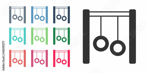 Black Gymnastic rings icon isolated on white background. Playground equipment with hanging rope with rings. Set icons colorful. Vector