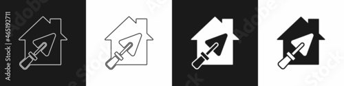 Set House or home with trowel icon isolated on black and white background. Adjusting, service, setting, maintenance, repair, fixing. Vector