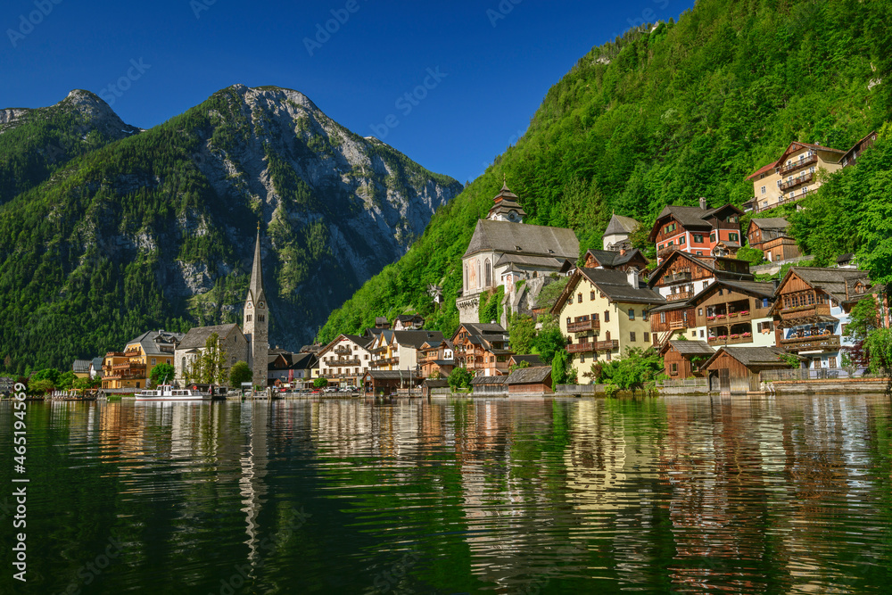 Idyllic shot of houses in Hallstatt town by lake Idyllic shot of houses in Hallstatt town by lake