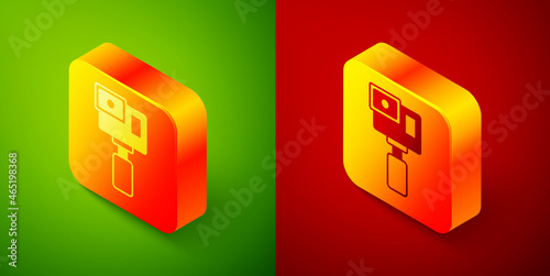 Isometric Action extreme camera icon isolated on green and red background. Video camera equipment for filming extreme sports. Square button. Vector