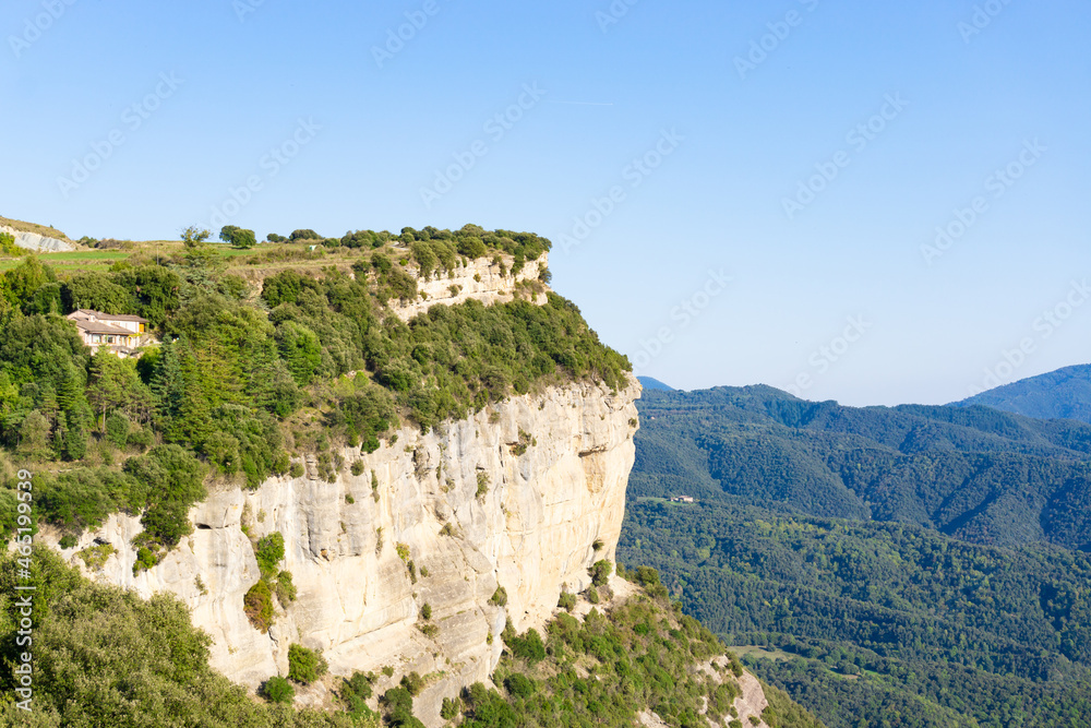 Mountain of high altitude rock climbers and vegetation Mountain of high altitude rock climbers and vegetation