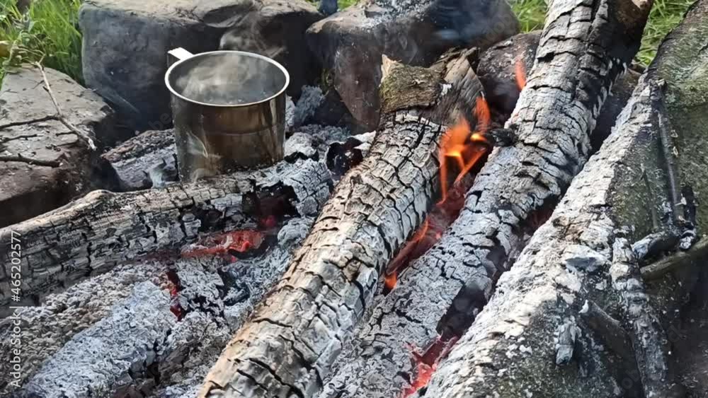 campfire. firewood burns out. outdoor recreation by the campfire. campfire. firewood burns out. outdoor recreation by the campfire.