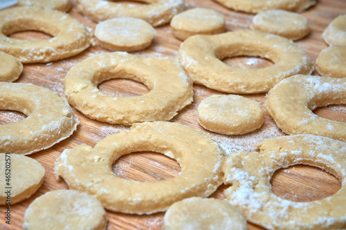 Blank for making curd donuts in the form of rings and balls. Home cooking, dough products © Oleksandr Marchenko