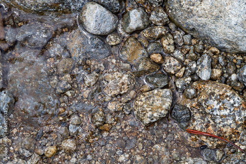 Granite stones texture in a stream