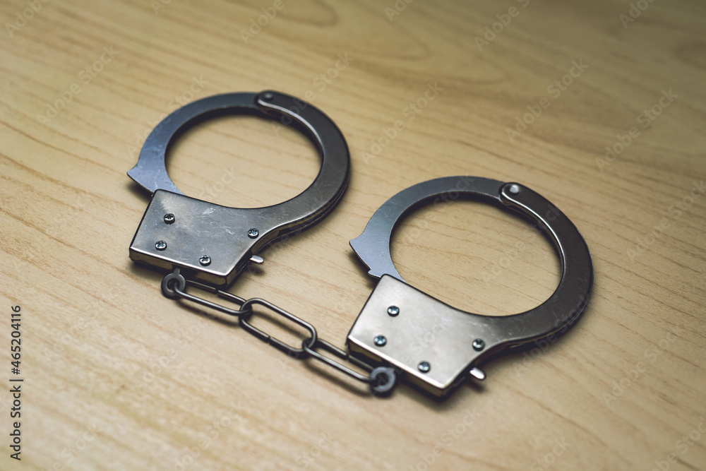 Obraz premium 手錠 逮捕 犯罪 悪