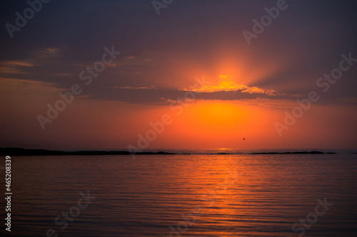 Sunrise over the Caspian Sea. Beautiful cloudscape over the sea, sunrise shot © Ermolaeva Olga