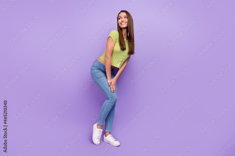 Full length body size view of attractive cheerful minded girl posing guessing isolated over purple violet color background Full length body size view of attractive cheerful minded girl posing guessing isolated over purple violet color background