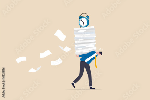 Workload and aggressive deadline causing exhaustion and burnout, overload or overworked office routine concept, tired businessman carrying heavy documents paperwork with alarm clock deadline on top.