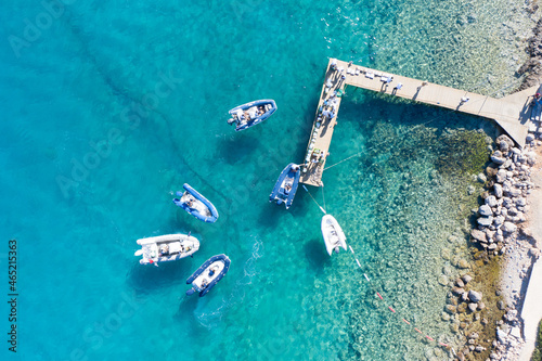 Fototapeta Naklejka Na Ścianę i Meble -  Inflatable boats are collecting extra food for the rest of the cruise trip.
