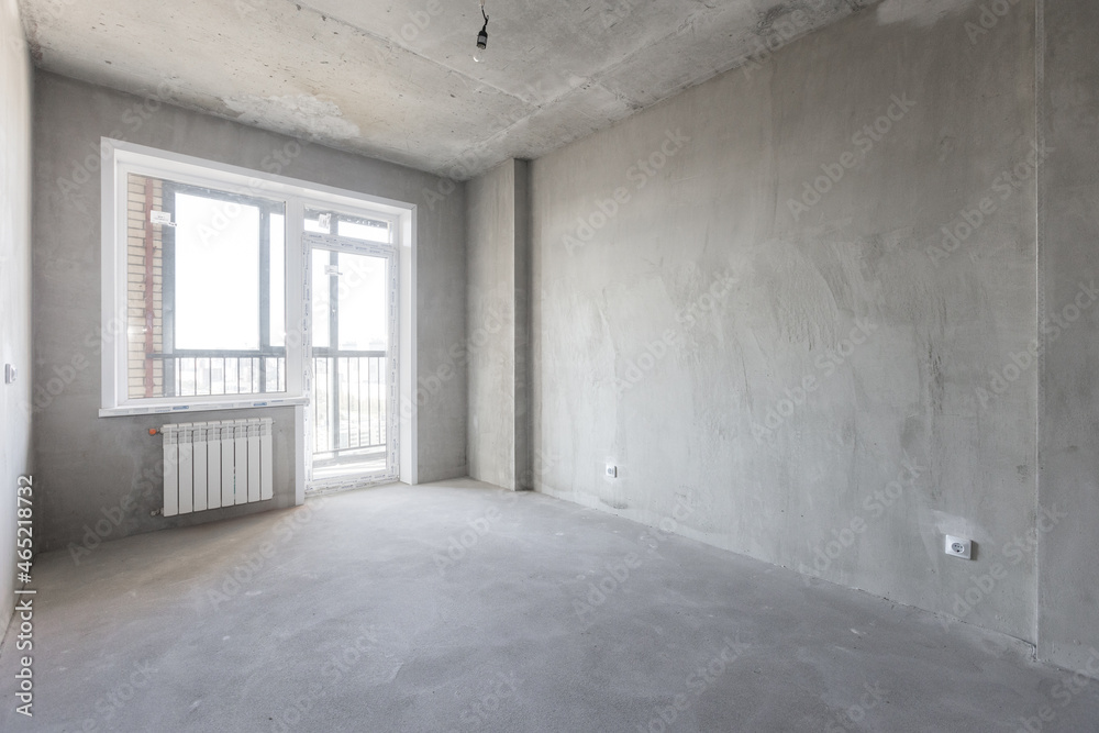 interior of the apartment without decoration in gray colors
