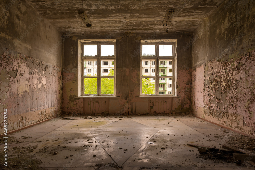 Large window in a ruined house, inside view Large window in a ruined house, inside view