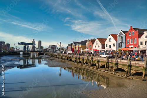 Husum harbor at ebb tide in the marshes, Germany photo